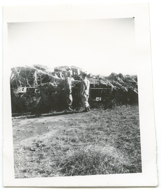 Soldati davanti a dei cingolati