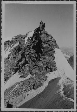 Uomini durante una scalata sul passo del Bernina